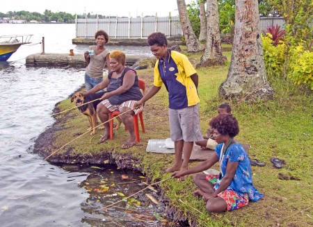 Sisilia and kids enjoy fine fishing in my front yard