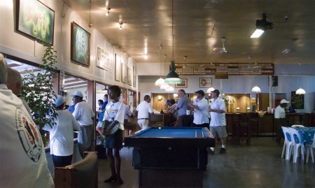 Inside the Madang Club fisherfolk and guests await the return of the boats on day one Inside the Madang Club fisherfolk and guests await the return of the boats on day one