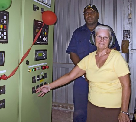 Eunice saying a little prayer before switching on a generator